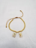 Pulsera de bolitas con dijes de fe PU2067G42