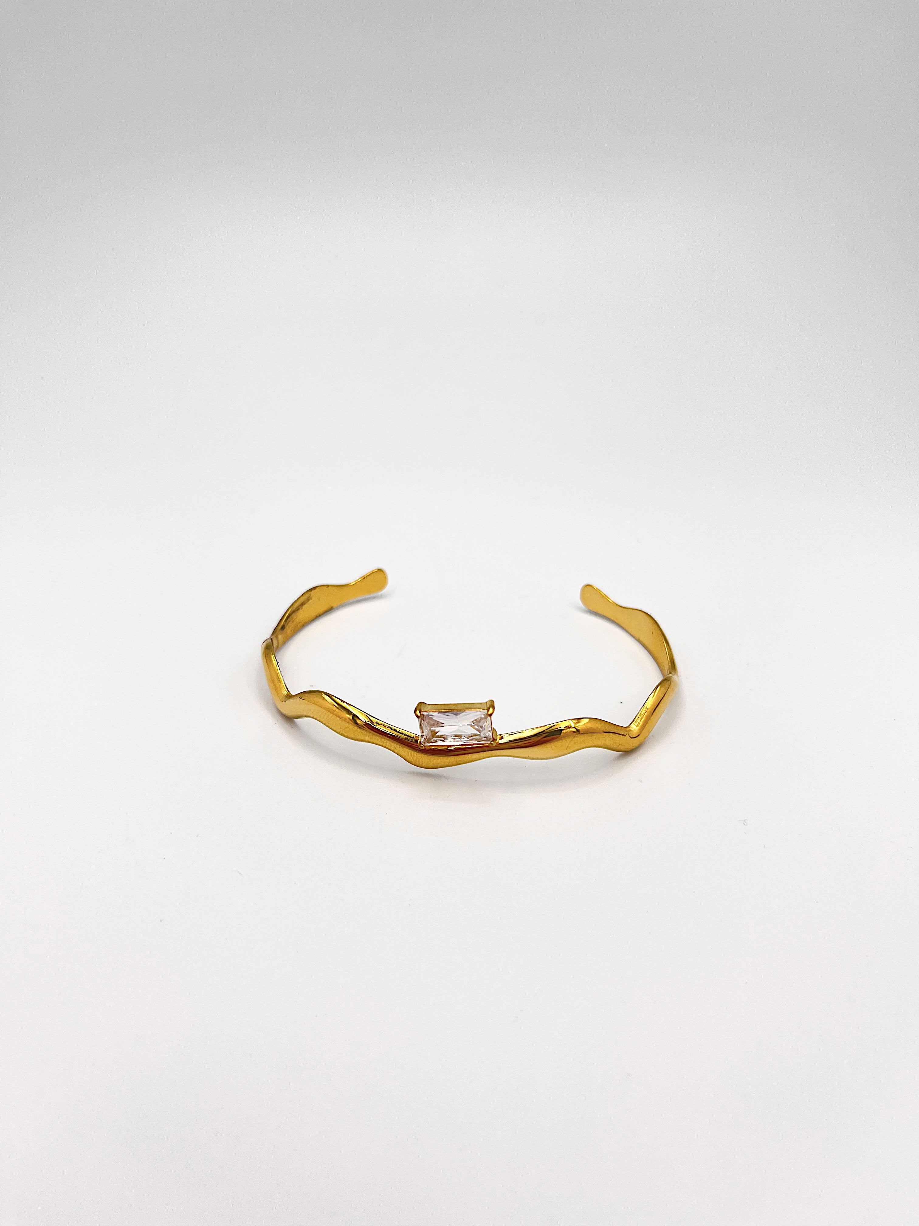 BRAZALETE DE ACERO EN FORMA DE ONDAS CON CIRCONIA RECTANGULAR PU2084G49