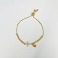 PULSERA CON CRUZ DE CIRCONES Y MEDALLA DE LA VIRGEN NIÑA BAÑO DE ORO PU2101G59