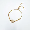 PULSERA CON DIJE DE TORTUGA EN BAÑO DE ORO Y CIRCONES PU2112G47