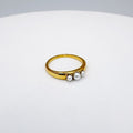 ANILLO CON TRES PERLAS SINTÉTICAS EN BAÑO DE ORO AN3962G45