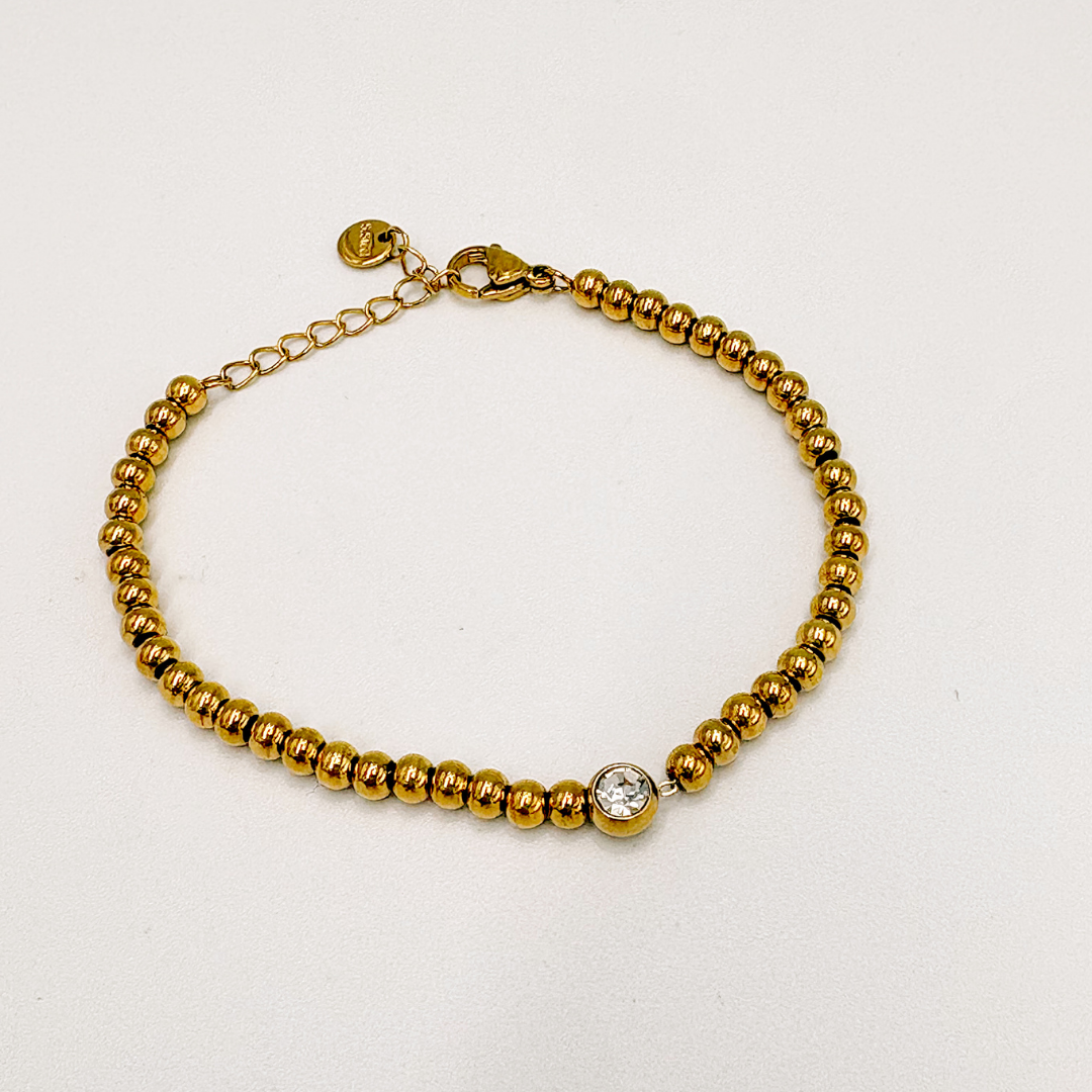PUSERA DE BOLITAS DE ACERO CON DIJE DE CRISTAL PU2119G49